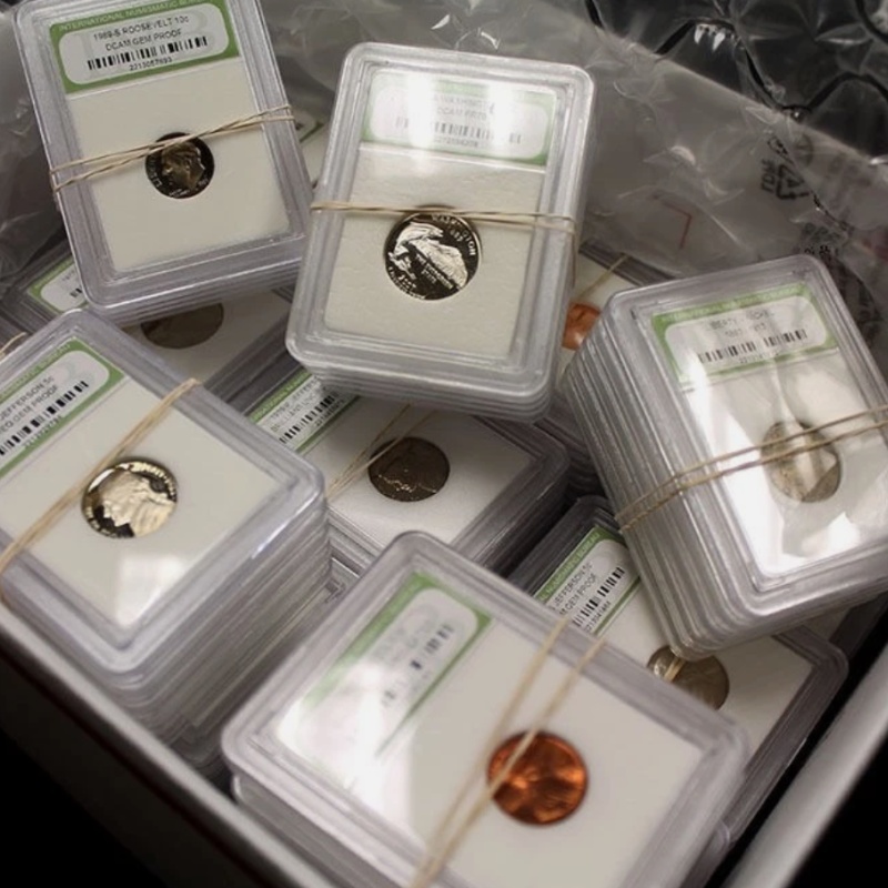 Over 100 Slabbed Coins. BU, Proof and Circulated US Coins